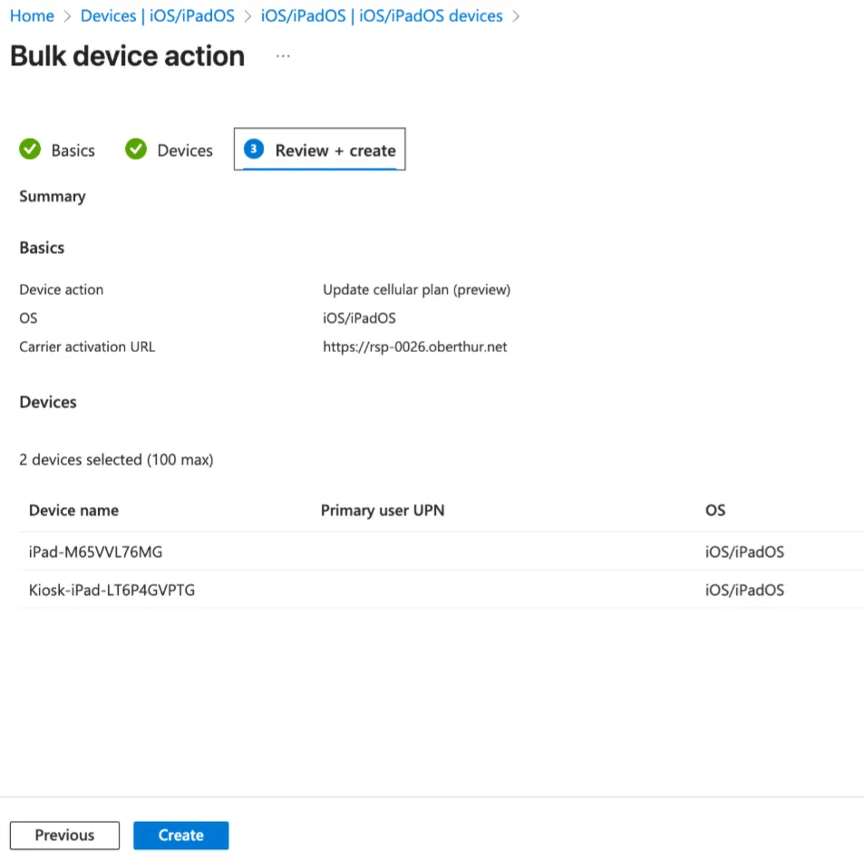 Review + create summary of the action, carrier activation URL, and selected devices above the Create button