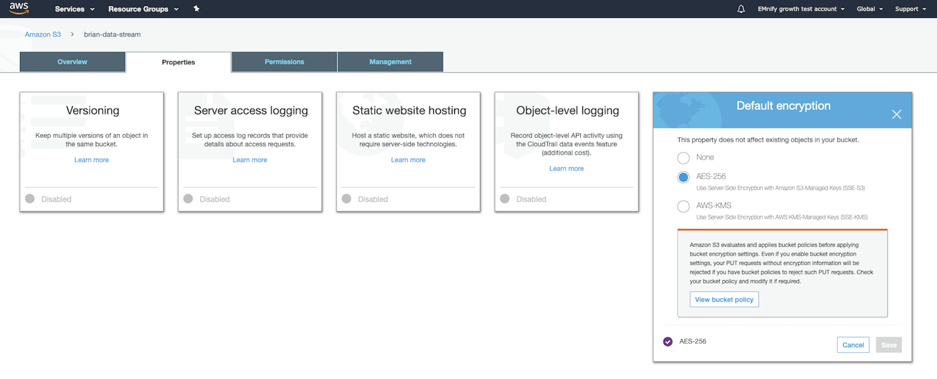 Screenshot from the same test S3 bucket. The 'Properties' tab is active, showing various available properties and their status. In this screenshot, all are disabled except 'Default encryption,' which has 'AES-256' as the selected value. A modal is visible, prompting you to 'View bucket policy.'